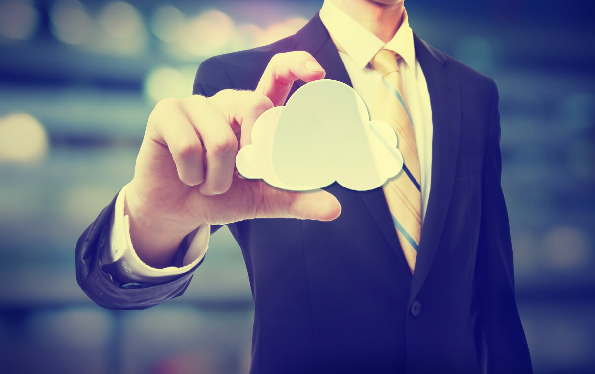 Man In Suit Holding Cloud Computing Image Concept