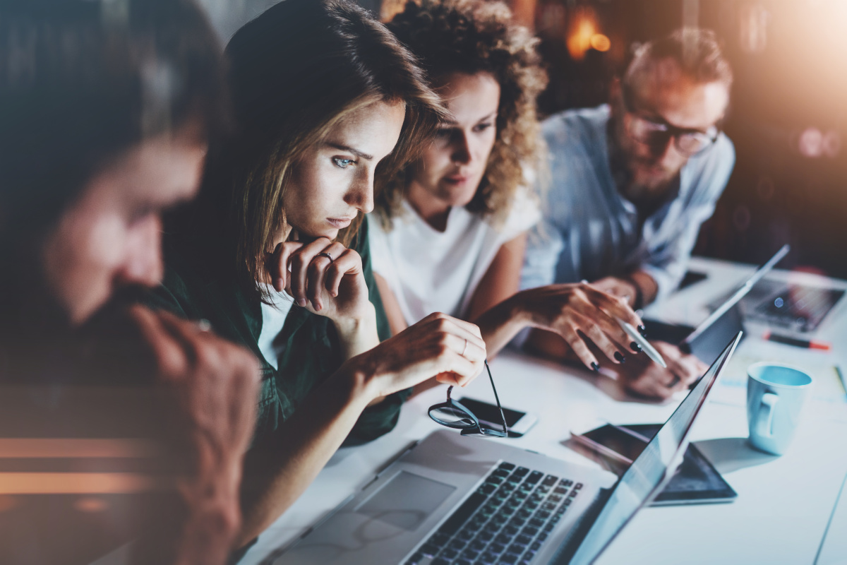 A group of people assessing a product or service