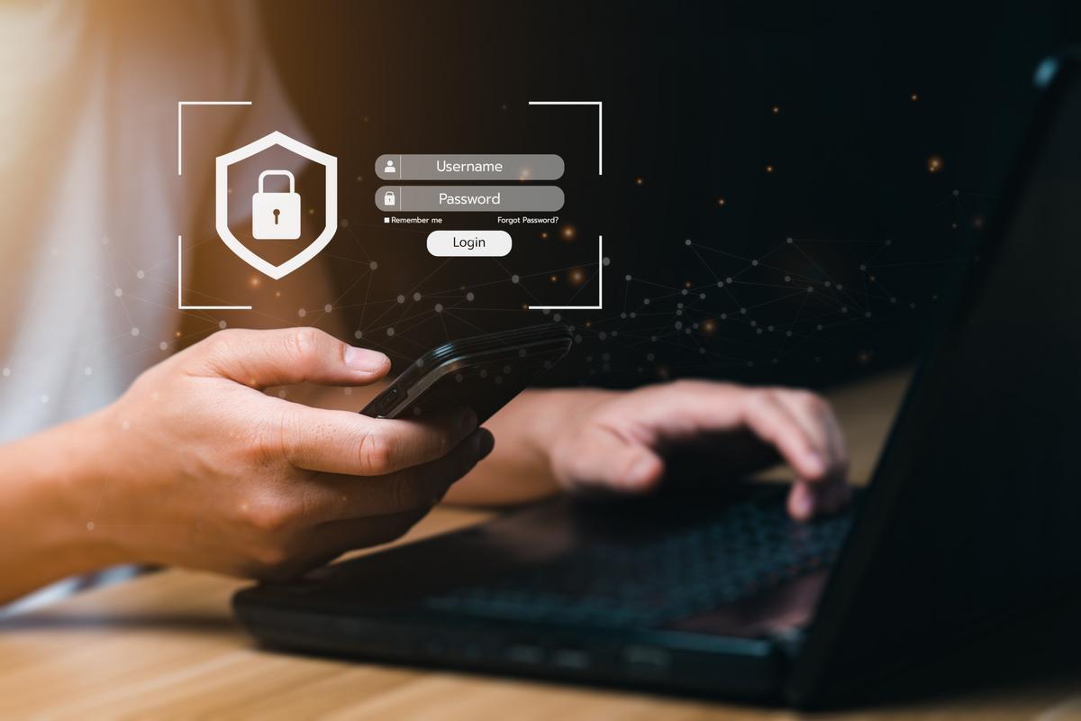 Man trying to access documents on his laptop