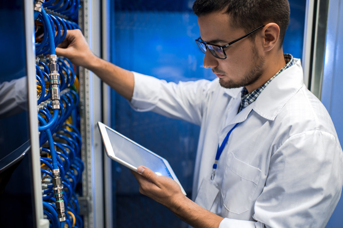 Man inspecting network server